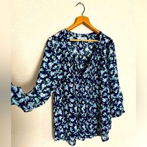 Long sleeve light weight floral maternity blouse with navy camisole.